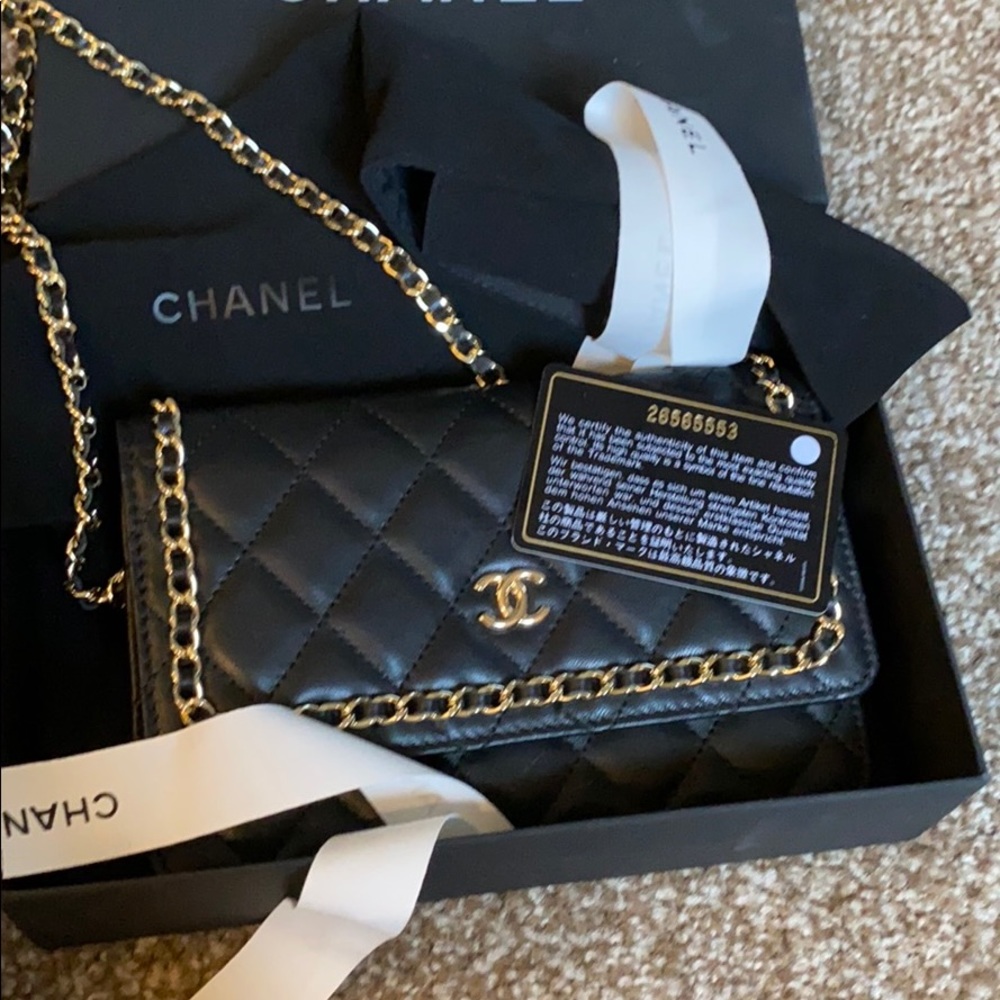 Chanel gold black lamb skin purse